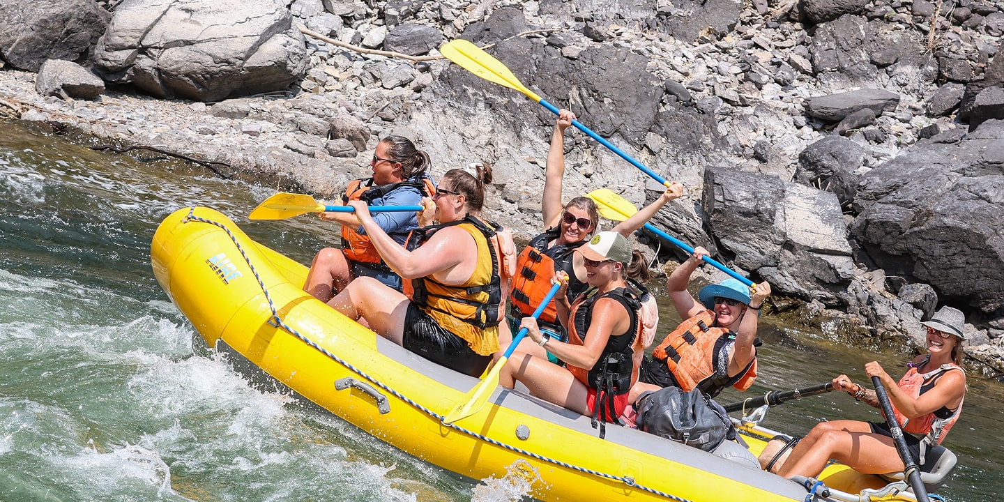 happy guests while clark fork whitewater rafting