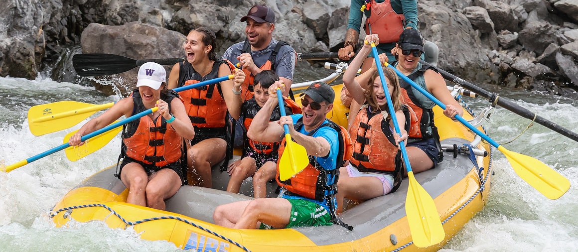 participants on a clark fork river whitewater rafting trip