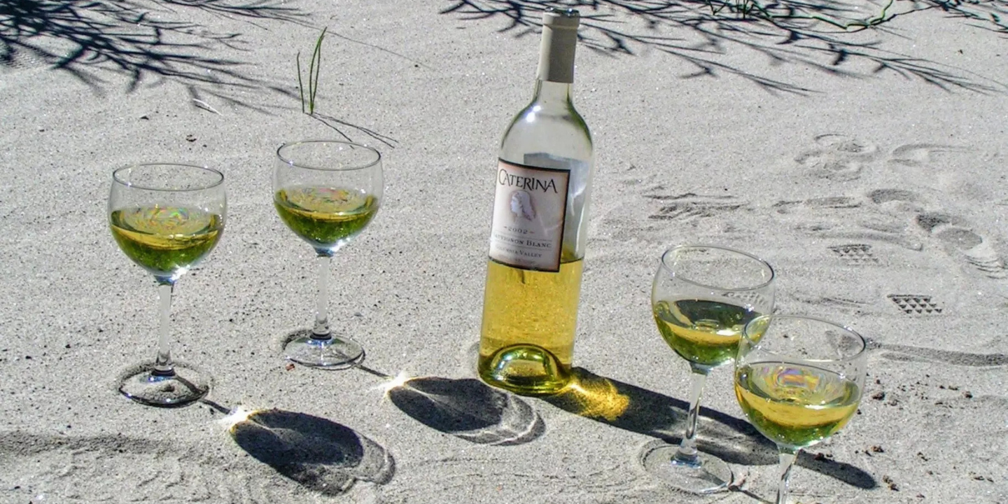 Local washington wine on river bank after rafting