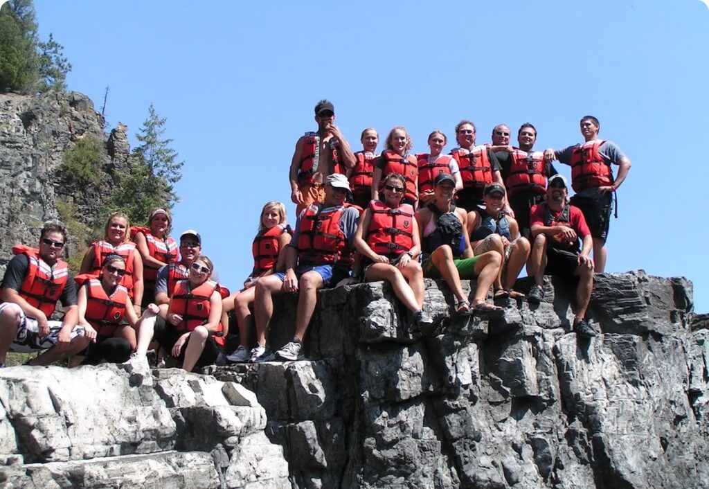 church group poses on group rafting trip