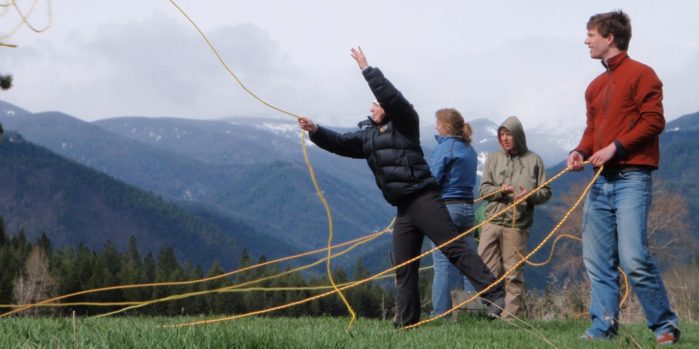 participants throw rope training while raft guide job training