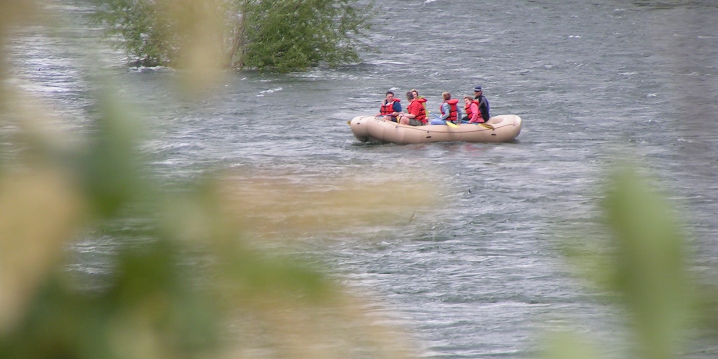 spokane family rafting photo through trees