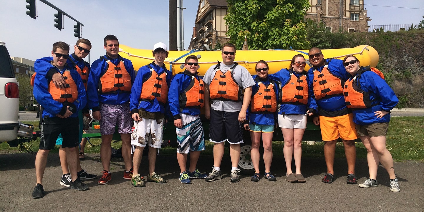 family photo before spokane river family rafting trip