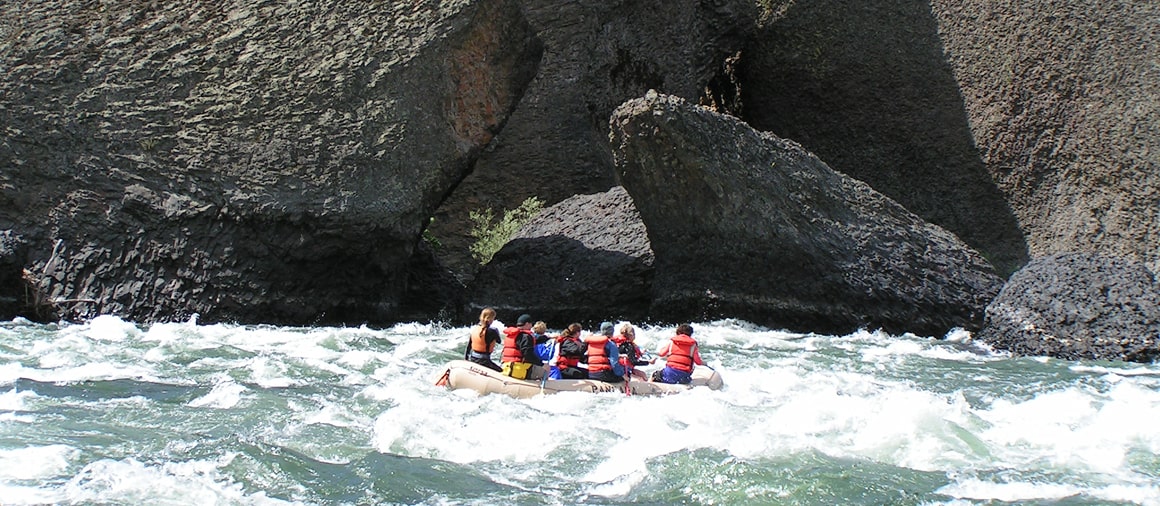 horizontal shot of Spokane river rafting